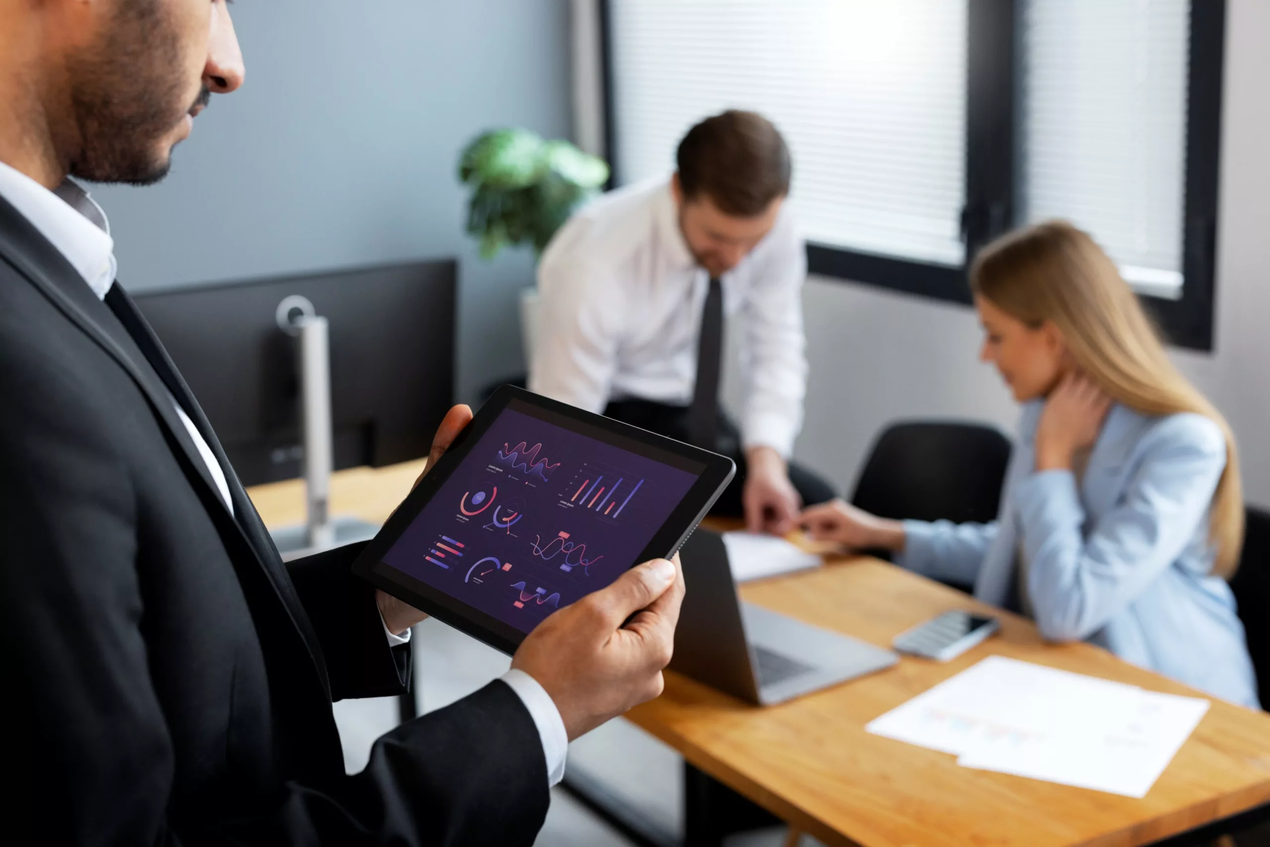 Business professionals collaborating on a strategy assessment for ERP consulting partner selection